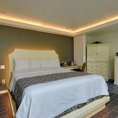 דאלאס Romantic Inn & Suites חדר תמונה