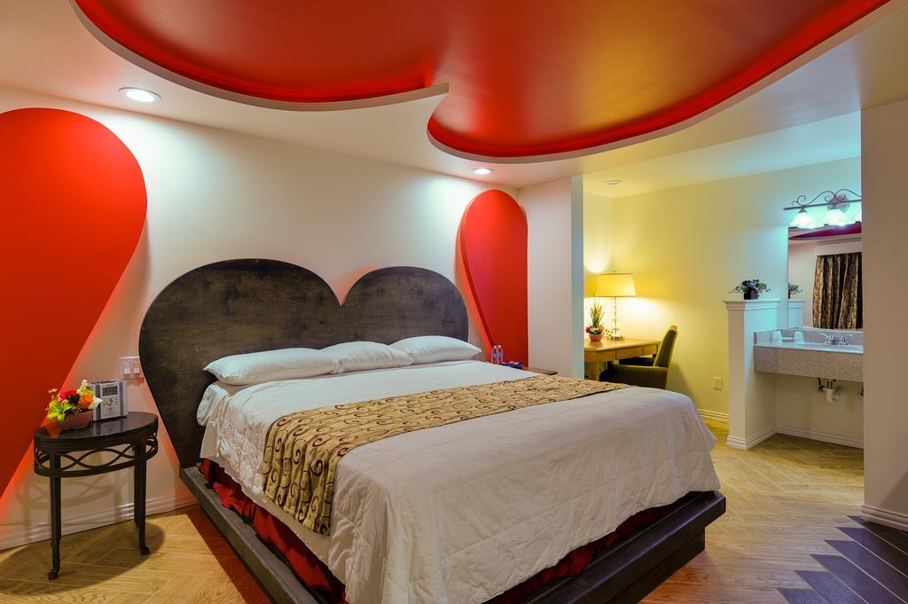 דאלאס Romantic Inn & Suites חדר תמונה