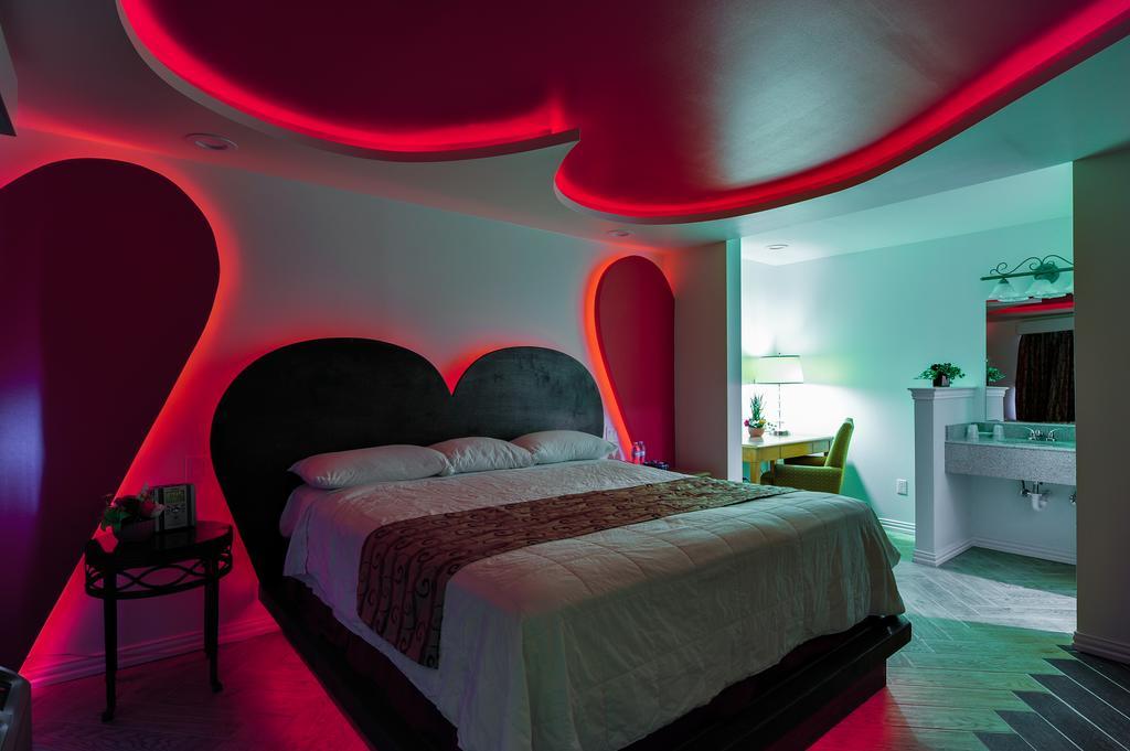 דאלאס Romantic Inn & Suites חדר תמונה