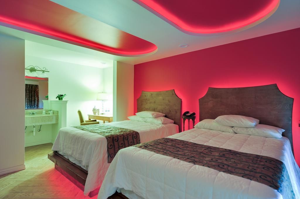 דאלאס Romantic Inn & Suites חדר תמונה